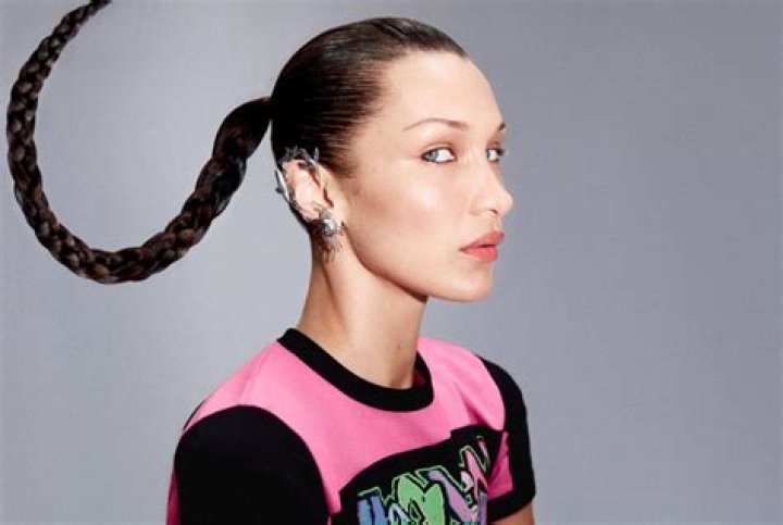 Bella Hadid Wore a Bra Top and Kirsten Dunst's Face for Marc Jacobs Heaven Campaign