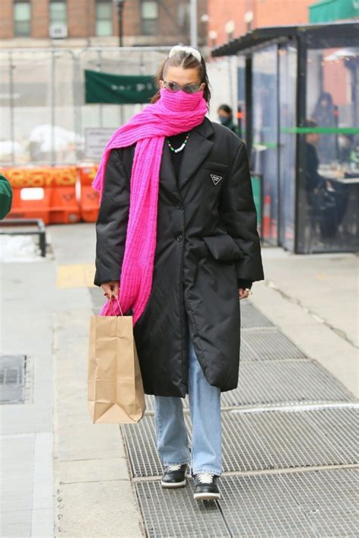 Bella Hadid Wore a Supersized Hot Pink Scarf With a Prada Coat