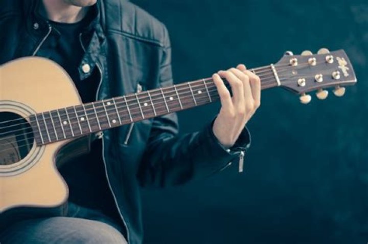 Best K-Pop Guitar Players | KpopStarz