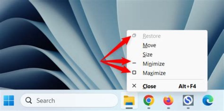 How do I minimize Genshin on my laptop?