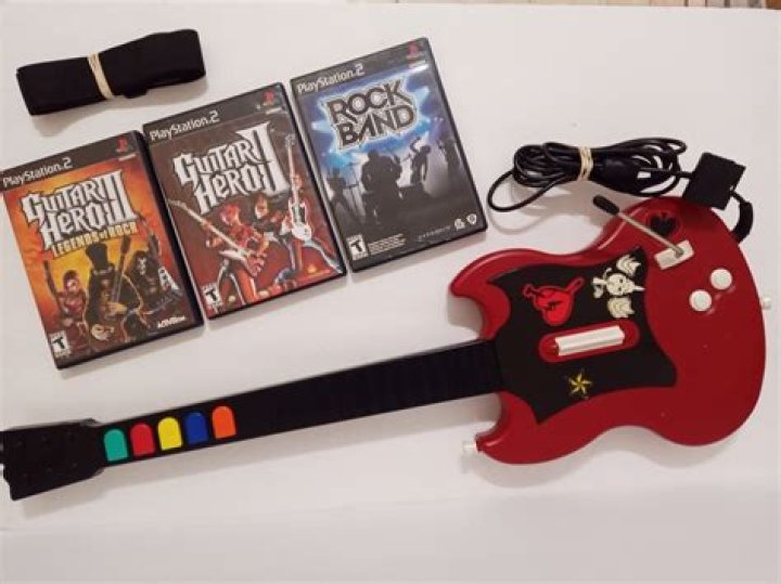 How do you unlock all songs on Guitar Hero 3 ps2?