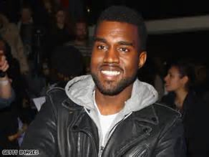 Kanye West, manager charged in airport scuffle
