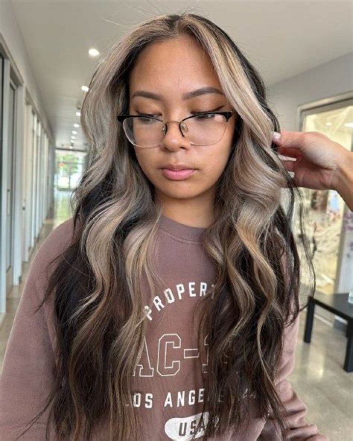 Lizzo Debuted a Shaggy Chin-Grazing Bob With Blonde Peekaboo Highlights