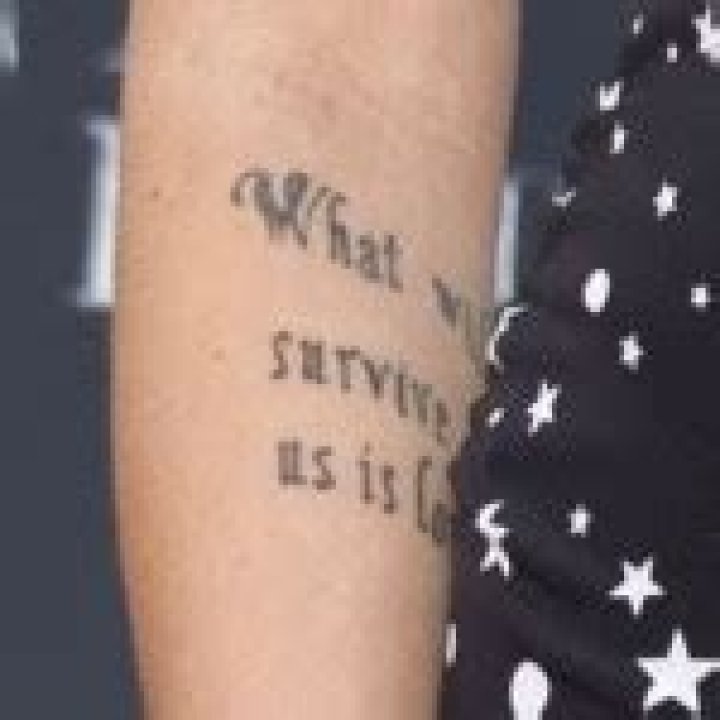 Miley Cyrus Writing Upper Arm Tattoo
