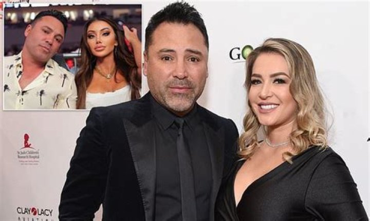 Oscar De La Hoya and Millie Corretjer