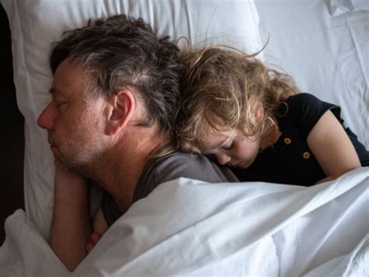 Parents Cuddling Kids To Sleep Puts Them At Risk For Insomnia