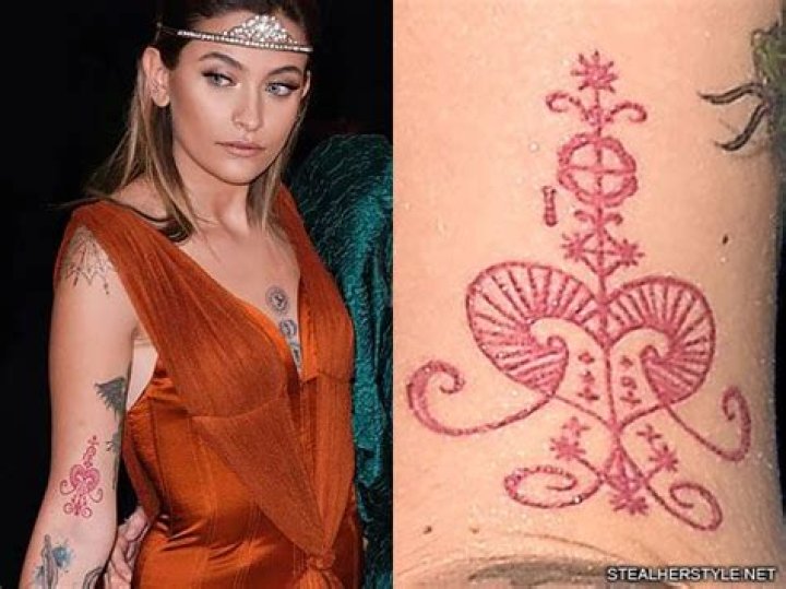 Paris Jackson Arrow, Deer, Heart Forearm Tattoo