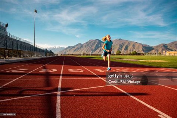 Runner Knocks Child To The Ground After He Ran On To Track During A Race
