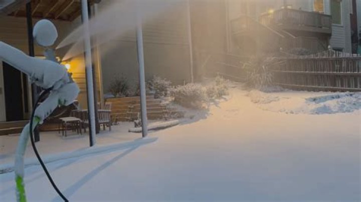 Smyrna dad uses cold weather to fill backyard with snow