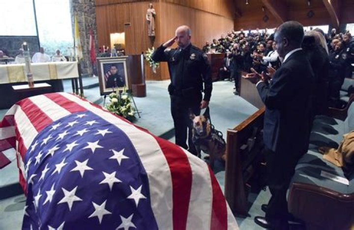 The funeral for Officer Edgar Isidro Flores